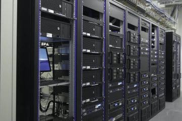 Many powerful servers running in the data center server room. Many servers in a data center. Many